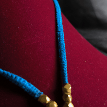 Dokra Necklace with Blue Thread and Round Pendant