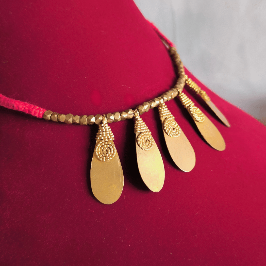 Dokra Necklace with Orange Thread and Petals