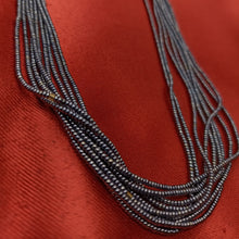 9 layered small grey beads necklace