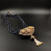 Black crystal beads necklace with ornate metal pendant