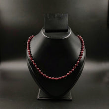 Single strand garnet necklace