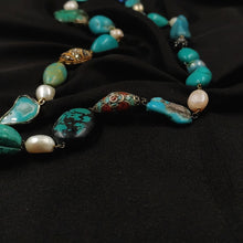 Turquoise necklace with shell pearls
