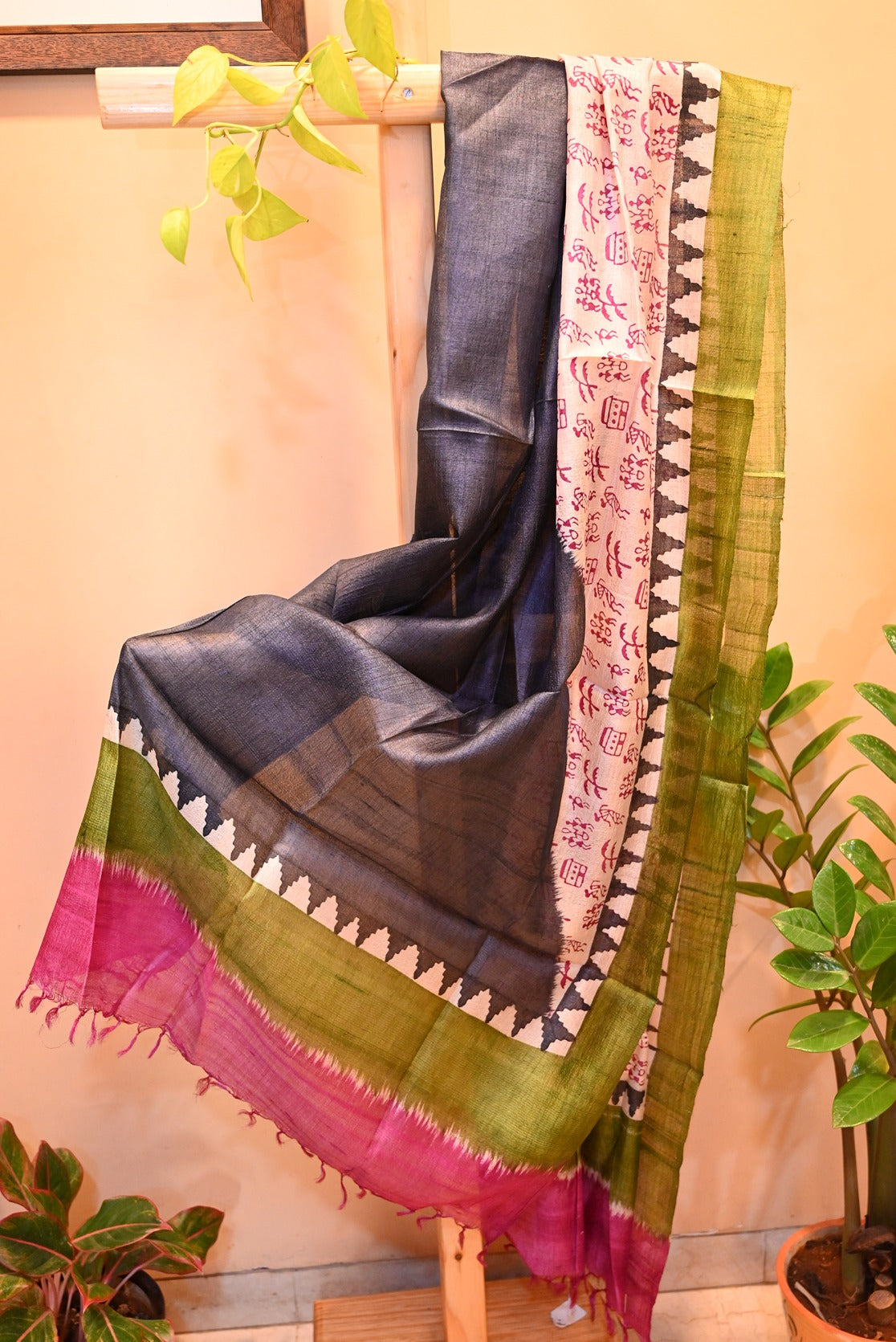 Black Tussar silk dupatta with warli print and tassels on both side borders with a touch of green and pink